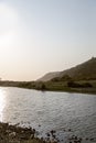 View of the river and the mountain during the beginning of the sunset