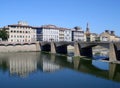 View of the river, old town Florence, and the bridge Ponte alle Grazie, Italy. Royalty Free Stock Photo