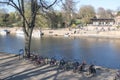 View of the River Ouse in York showing recreation areas and bikes on bike rack