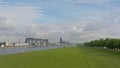 View on River Rhine with Kranhaus buildings and cathedral from the green borders of Poller Wiesen park Royalty Free Stock Photo