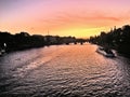 A view of the River Seine in Paris at dusk showing a sunset Royalty Free Stock Photo