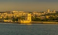 A view from the river Tagus of the Belem Tower in the Belem district of Lisbon, Portugal in the golden early morning light