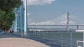 View from river Tagus waterfront of Lisbon's Nations park and Vasco da Gama Bridge timelapse, Portugal Royalty Free Stock Photo