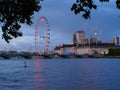 View of the River Thames with Westminster Bridge, London Eye and the architectural buildings of the South Bank at night. Royalty Free Stock Photo