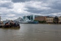 River themes, military museum boat in sight, cloudy sky above. Royalty Free Stock Photo