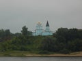 View from the river to the church. Christian orthodox temple. Russia.