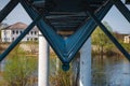 View of the river under the bridge. View of the bridge from below the river on a Sunny summer day Royalty Free Stock Photo