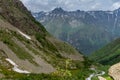 View of the river valley, the mountain range under the clouds and rocky slopes. Landscape, tinted Royalty Free Stock Photo