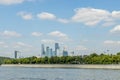 View of riverside of Moscow river and Moscow city skyscrapers behind the trees Royalty Free Stock Photo