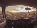 View the road inside an old van. Travel life.