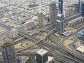 View of the road junction and the city of Dubai from the observation deck of the Burj Khalifa tower Royalty Free Stock Photo