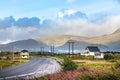 View from a road with mountains and wooden houses, Leknes, Norway Royalty Free Stock Photo