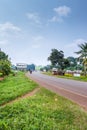 View of a road passing through a small town with houseÃ¢â¬â¢s and vehicles, Rweteera, Fort Portal, Uganda Royalty Free Stock Photo