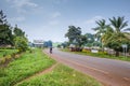 View of a road passing through a small town with houseÃ¢â¬â¢s and vehicles, Rweteera, Fort Portal, Uganda