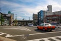 View of road and traffic at intersection in Kyoto, Japan. Royalty Free Stock Photo