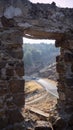 View of road from the window of a stone house Royalty Free Stock Photo