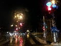 View of the road through the windshield of the car in the rain Royalty Free Stock Photo