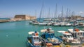 View on a Rocca a Mare fortress and port with boats in Heraklion, Crete island, Greece, 18 july 2019 Royalty Free Stock Photo