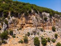 Rock-cut tomb carved in vertical rock, Cyaneae, Turkey Royalty Free Stock Photo