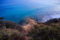 View on the rock and the ocean with blue water Royalty Free Stock Photo