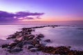 View of rock pool from the shoreline at sunrise, Cape Town, South Africa