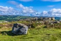 A view of a rock summit on Ilkley moor above the town of Ilkley Yorkshire, UK Royalty Free Stock Photo