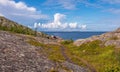 View of rocks of the archipelago of Kuzova,sea, blue sky, clouds Royalty Free Stock Photo