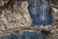 View of rocks broken down for construction in a hilly region. Remains of rock in a quarry