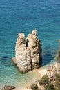 View of rocks on coastline of turquoise blue sea Greece, Halkidiki, Athos peninsula Trimi beach Geological wonder nature