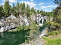 View of the rocks and the emerald water of the Marble Canyon in the Ruskeala Mountain Park, which reflects the sky and rocks on a Royalty Free Stock Photo