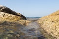 View through the rocks in an endless sea