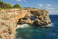 View on rocks with hole and deep blue sea.Mallorca Island, Spain Royalty Free Stock Photo