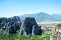 View of rocks, mauntain and greek green valley with village. Meteora, Greece