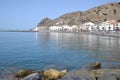 View from the rocks of the sea with the watchtower in the background in Castle of toilet