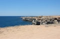 View from the rocky coast of Cape Atlesh to the lighthouse. Western Crimea