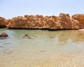 View of the rocky coast of the Red Sea from the sea. tinted Royalty Free Stock Photo