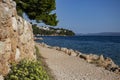 Croatian coastline with rock wall Royalty Free Stock Photo