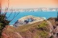 View of the rocky seashore. Natural arch in the rock Royalty Free Stock Photo