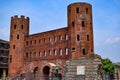 View of the Roman archaeological remains of the city and the Palatine Gate, a treasure of civilization in detail.