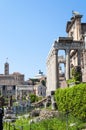 View from the Roman Forum, Temple of Antoninus and Faustina, Arch of Septimius Severus and Vittoriano in the distance.