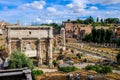 View of the Roman Forums, Septimus Severus Triumphal Arch and Palatine. Ruins of Ancient Rome. Royalty Free Stock Photo