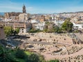 View of the roman theatre of Malaga, Spain on a sunny day. The Cathedral and Picasso Museum Royalty Free Stock Photo