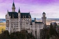 View of romantic Neuschwanstein castle at sunset in Bavaria, Germany Royalty Free Stock Photo