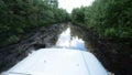 View from roof of the allroad vehicle when riding through liquid mud, Karelia