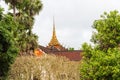 View of the roof of the Buddhist temple building in Louangphabang, Laos. Copy space for text. Royalty Free Stock Photo