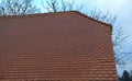 View of the roof made of red brick burnt tiles of the beaver type used in Central Europe on all historical roofs, especially in Au Royalty Free Stock Photo