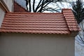 View of the roof made of red brick burnt tiles of the beaver type used in Central Europe on all historical roofs, especially in Au Royalty Free Stock Photo