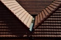 View of the roof made of red brick burnt tiles of the beaver type used in Central Europe on all historical roofs, especially in Au Royalty Free Stock Photo