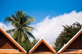 View of the roofs of buddhist buildings, Louangphabang, Laos. Copy space for text. Royalty Free Stock Photo