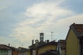 View of roofs of houses with tiles on a background of blue sky Royalty Free Stock Photo